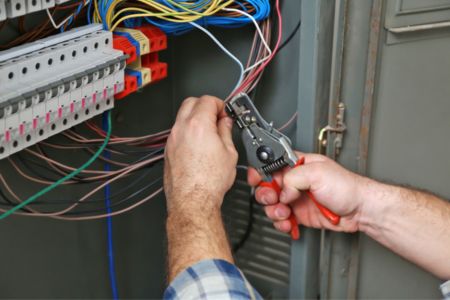 Certified electrician replacing electrical panel.